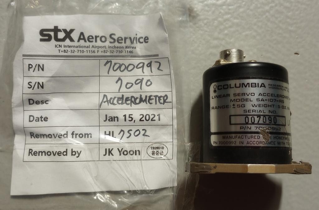7000992