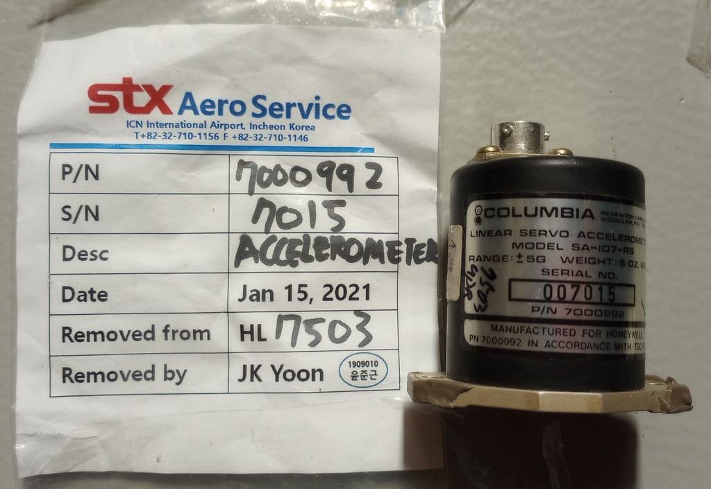 7000992