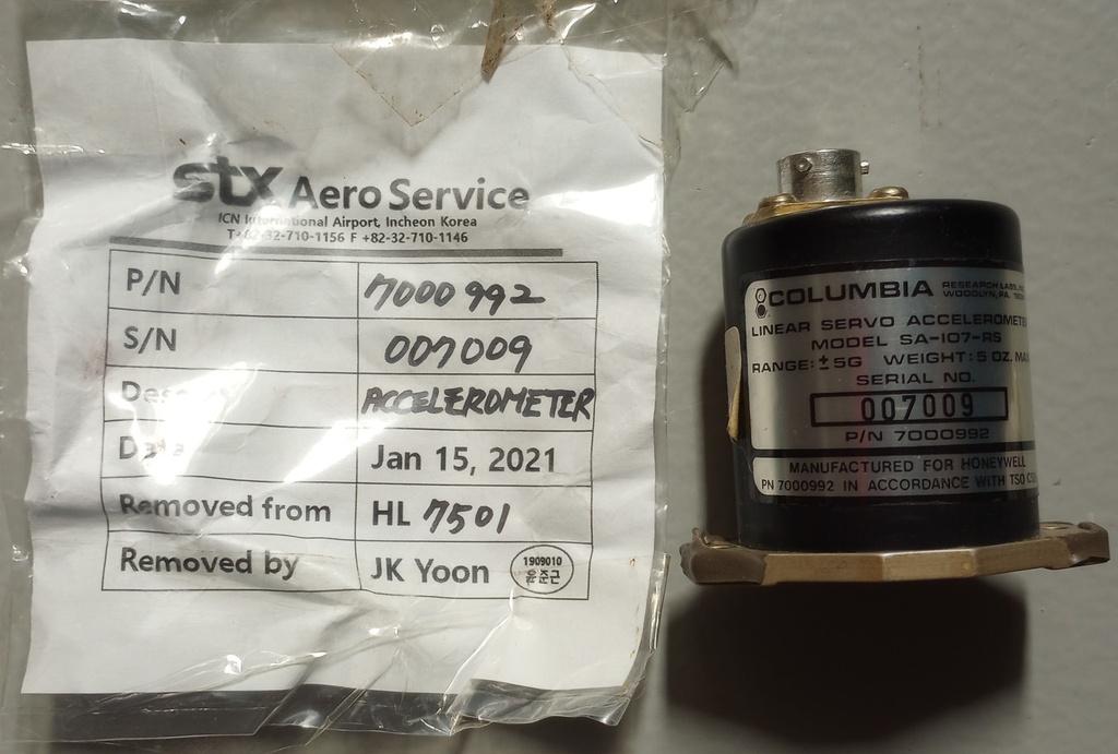 7000992